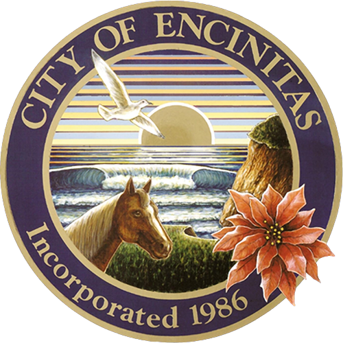 City of Encinitas seal with sun, waves, white bird, horse, and pink flower; “Incorporated 1986” text