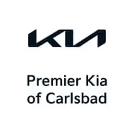 Kia logo above “Premier Kia of Carlsbad” dealership text